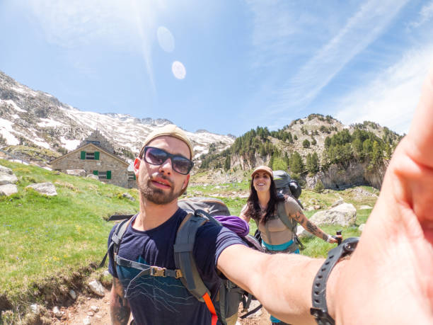 istock Young couple trekking in the Pyrenees, selfie 1432253813
