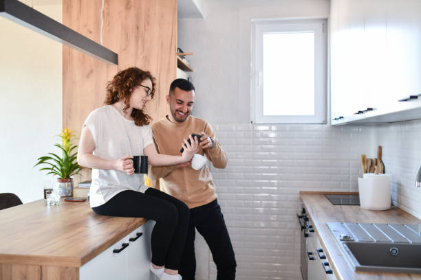 istock Couple Browsing Social Media During Coffee Time 1432254529