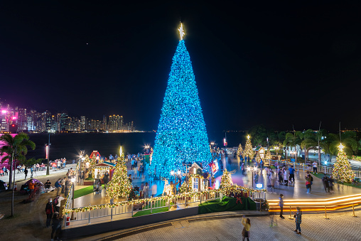 Hong Kong, China - December 03, 2021 : The giant Christmas tree in West Kowloon cultural district in Hong Kong city