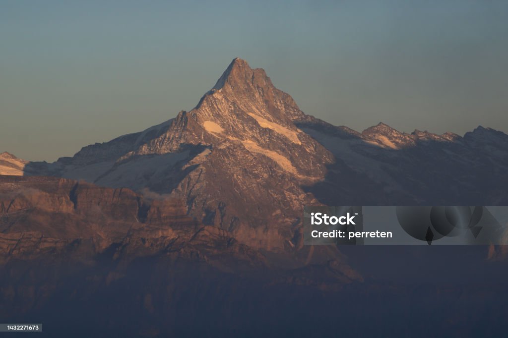 Mount Schreckhorn in autumn, Switzerland. Mount Schreckhorn at sunset, view from Mount Niederhorn. Color Image Stock Photo