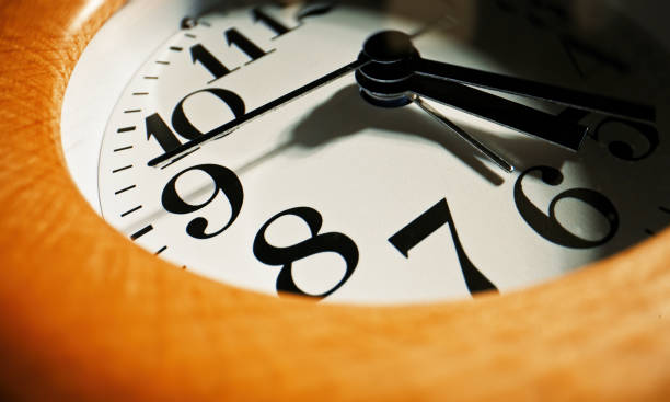 istock Wooden round clock. Close-up view. 1432279504