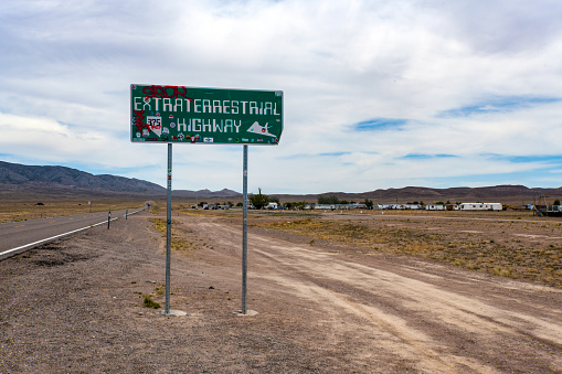 A highway sign on Nevada Route 375 in Rachel, Nevada. The sign names the highway as Extraterrestrial Highway.\nRachel, NV, USA\n06/09/2022