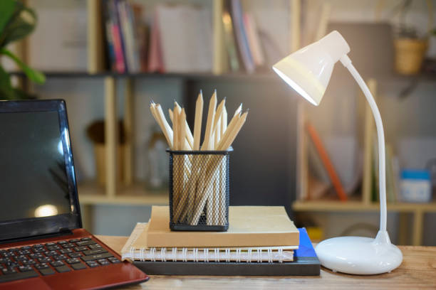 istock Planner write meeting agenda at Calendar book, work online at home. Diary for organizer to plan timetable, daily appointment, and management job at office desk. Planner book and Calendar 2023 Concept. 1432286873
