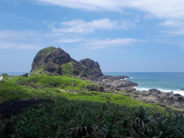 istock Huge rocks by the sea 1432288321