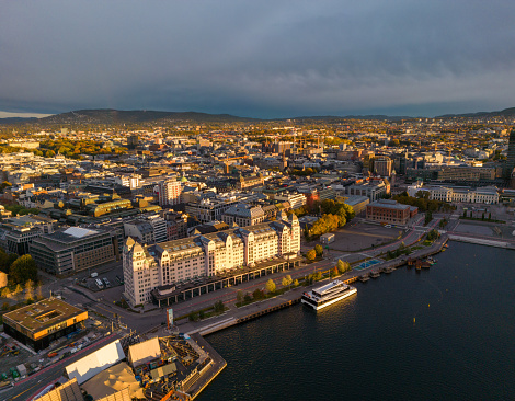 Oslo waterfront cityscape aerial view with docked ferry. Legal drone flight with special permission obtained from local aviation authority.