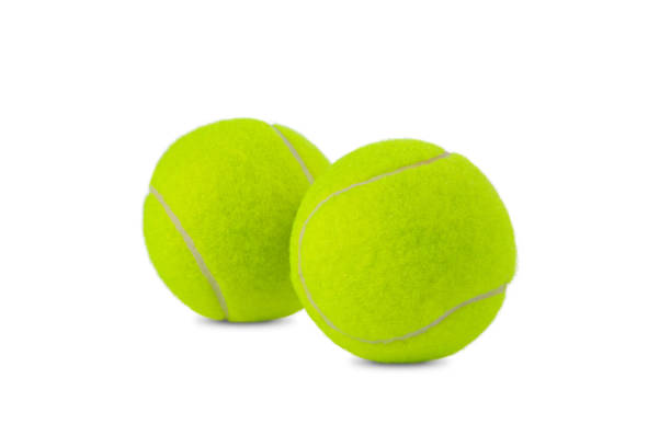 зеленый теннисный мяч, изолированный на белом фоне - tennis ball tennis ball white стоковые фото и изображения