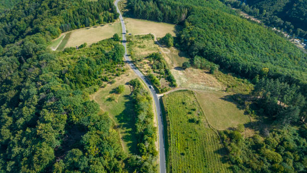 istock Country road - aerial view 1432304200