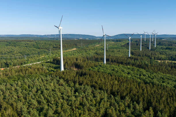 istock Wind turbines and forest - aerial view 1432305337