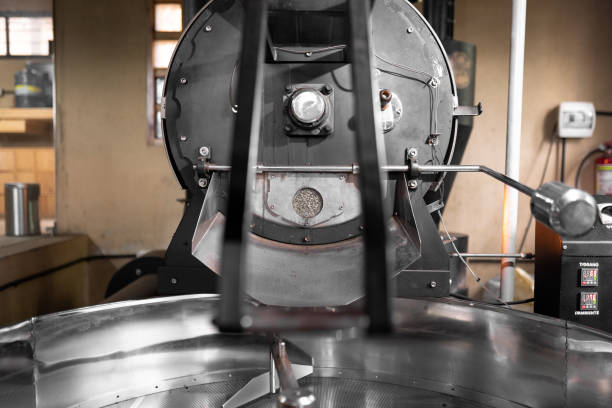 istock White coffee beans are resting inside of a big coffee roaster machine 1432305368