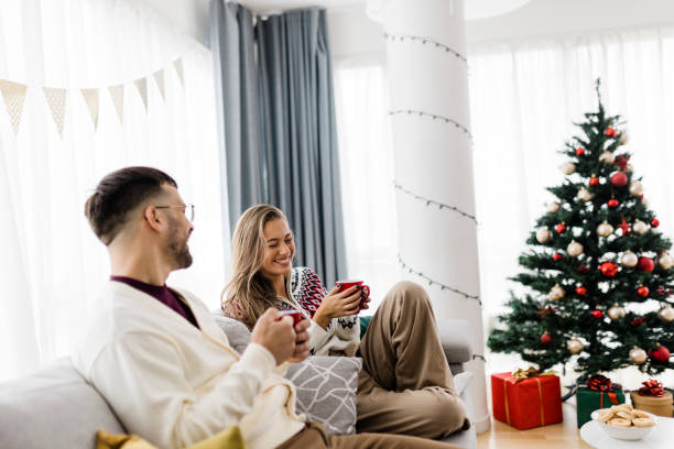 istock Young Couple Celebrating New Year At Home 1432305747
