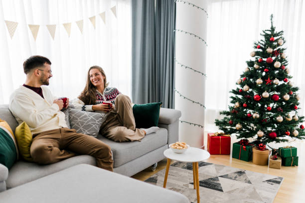 istock Young Couple Celebrating New Year At Home 1432305787