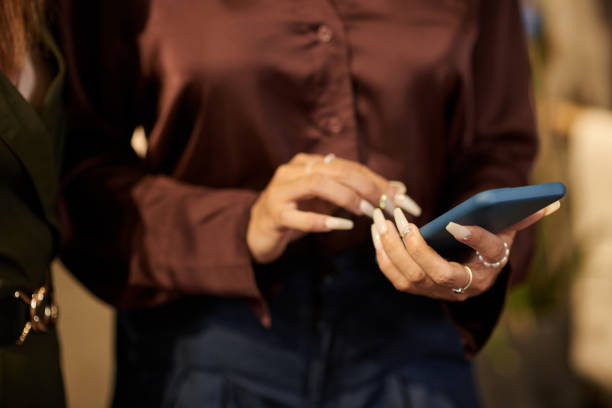 istock Woman communicating online on mobile phone 1432306278
