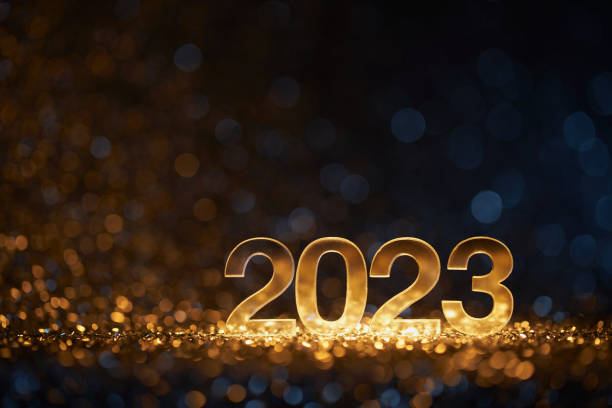 Golden New Year 2023 on defocused lights - Party Celebration Christmas Gold stock photo