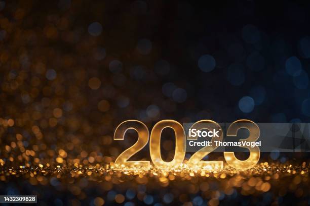 Golden New Year 2023 On Defocused Lights Party Celebration Christmas Gold Stock Photo - Download Image Now