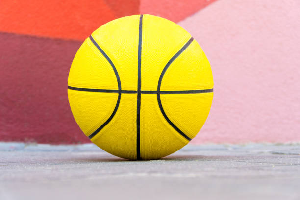 istock Yellow basket ball on with colorful background 1432310788