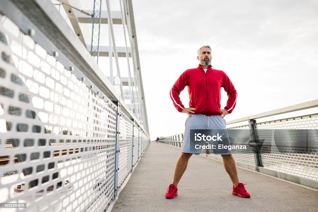Portrait of sporty senior man outdoors Active Lifestyle Stock Photo