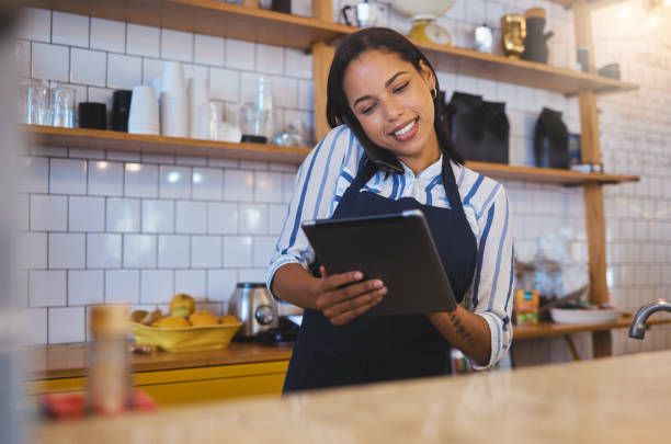 istock Restaurant worker on tablet, phone call and making food payment, delivery or crm conversation with a customer. Business owner or manager of fast food store, coffee shop or cafe shopping for supplies 1432312912