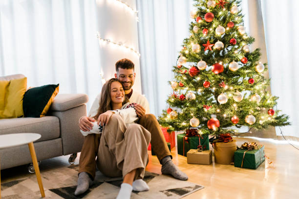 istock Young couple spending New Year's holidays at home 1432316516