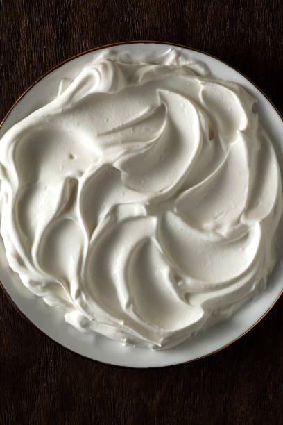 istock A plate of smeared yogurt on a wooden table 1432316877