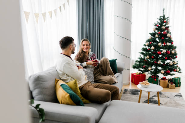 istock Young Couple Celebrating New Year At Home 1432321606
