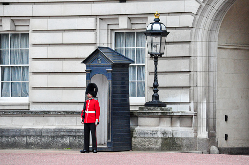 Royal Guard of London with Buckingham Palace Soldier Uniform and Oversized Bearskin Hat. 3D Illustration.