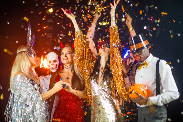 istock People dance at Halloween party 1432328182