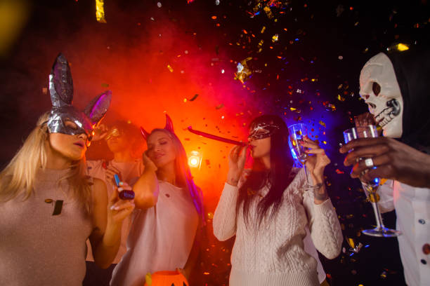 istock People dance at Halloween party 1432328201