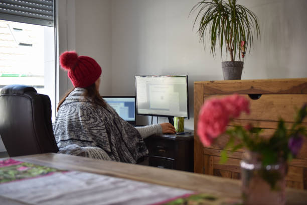 istock young woman working from home in winter 1432328374
