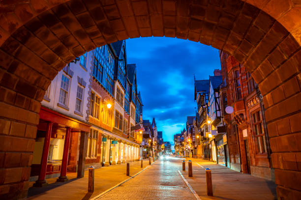 istock Chester Eastgate clock tower arch at sunset dusk in England UK 1432329021