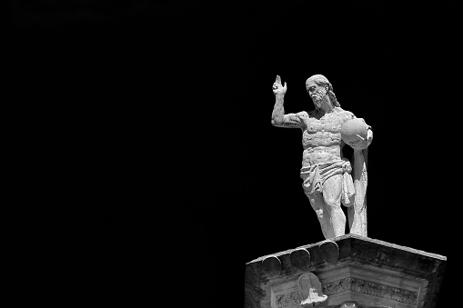 The goddess of love in Greek mythology, Aphrodite (Venus in Roman mythology). Ancient statue isolated on white background.