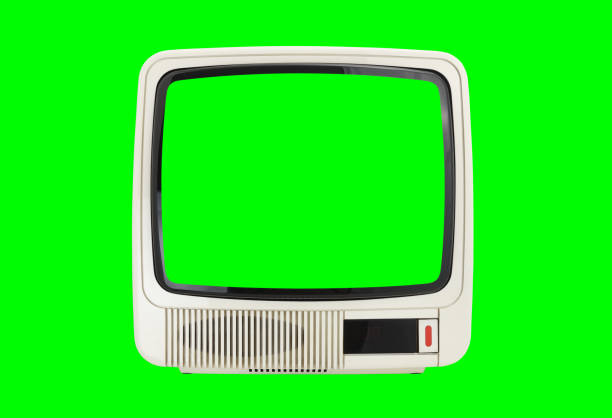 istock Old vintage white TV with green screen isolated on green background. 1432334595
