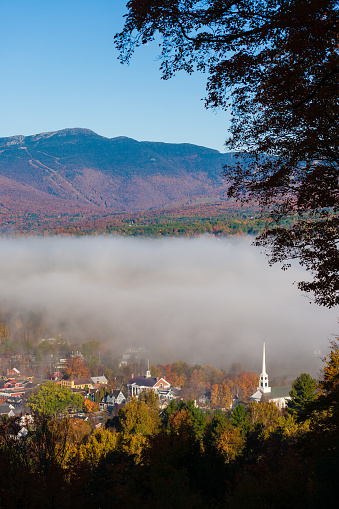 Overlooking the sleepy New England of Stowe Vermont USA on an colorful autumn morning
