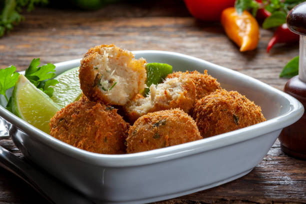 istock cod dumpling, salt cod fritters, bunuelos de bacalao. Brazilian snack 