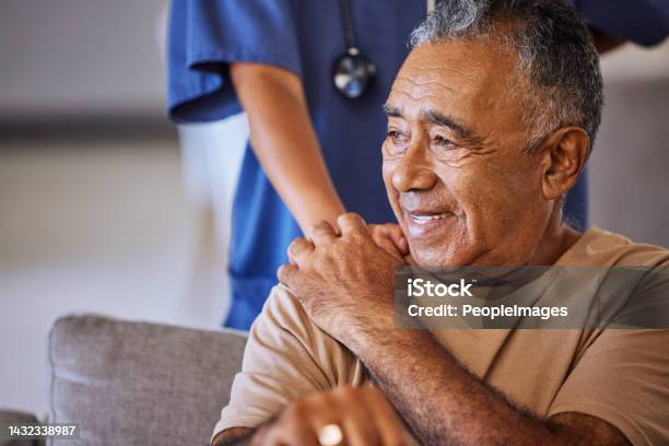 Nurse Or Doctor Give Man Support During Recovery Or Loss Caregiver Holding Hand Of Her Sad Senior Patient And Showing Kindness While Doing A Checkup At A Retirement Old Age Home Or Hospital Stock Photo - Download Image Now