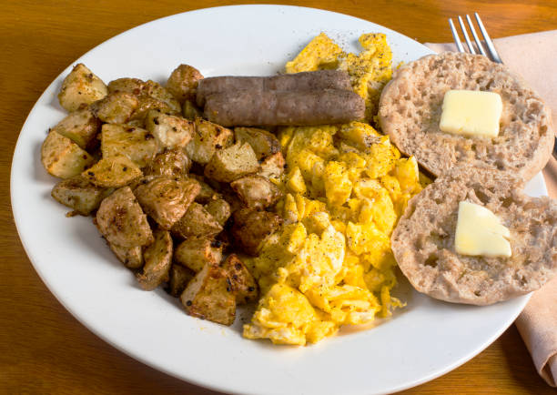 istock scrambled eggs season with pepper and served with home fries 1432339565