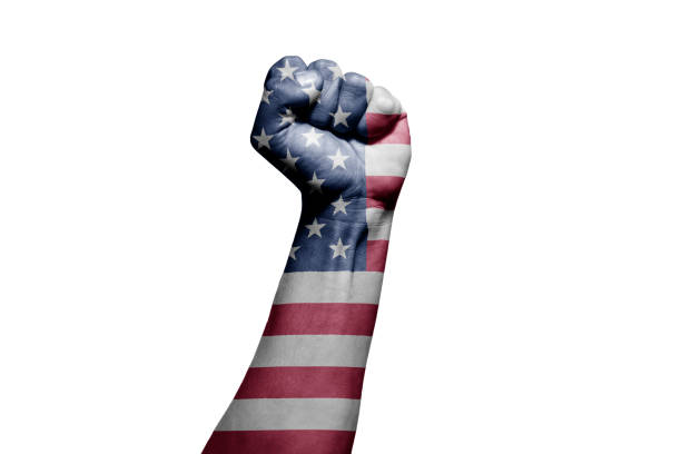 istock Man's hand in a fight signal with the countries flag. 1432340496