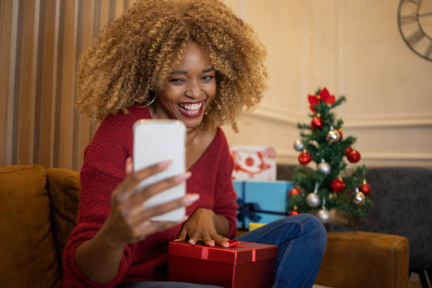 istock Happy woman celebrating Christmas 1432340818