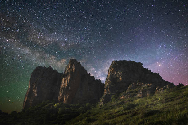 istock Night landscape, high cliffs in the starry night with milky way galaxy. 1432349749
