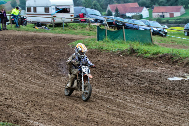 part of offroad competition track on muddy track. motocross clay base