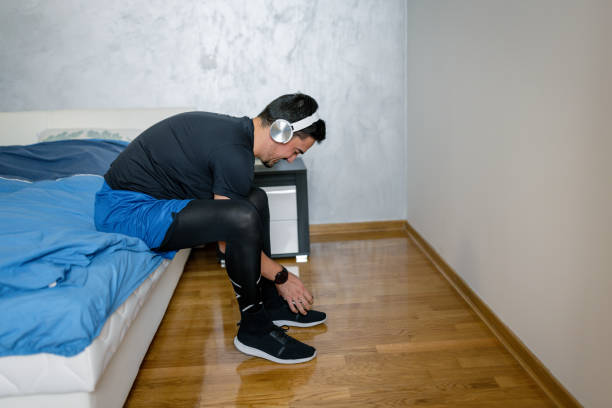 istock Getting ready for workout and listening to music 1432353135