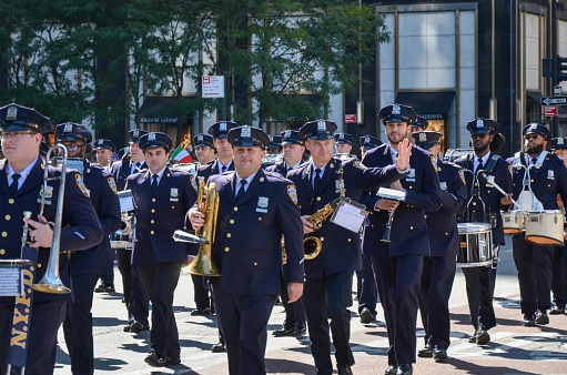 New York City, United States. 10th OCT, 2022. NYPD marching band at the Annual Italian Heritage Day Parade along Fifth Avenue, New York City.