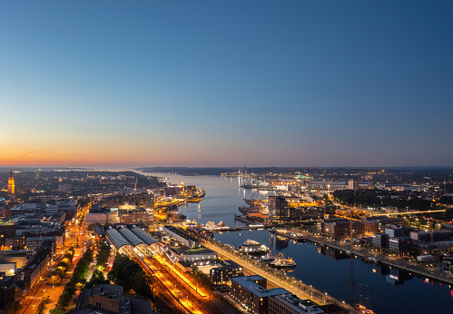 Beautiful aerial night cityscape of Kiel (Schleswig-Holstein, Germany) at blue hour
