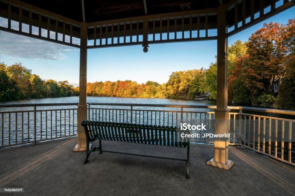 A gazebo park structure in autumn at Mill Pond in Centennial Park, Milton, Ontario, Canada Architecture Stock Photo