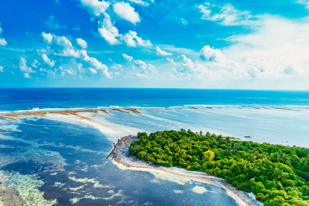Aerial drone view of deserted island in Maldives stock photo