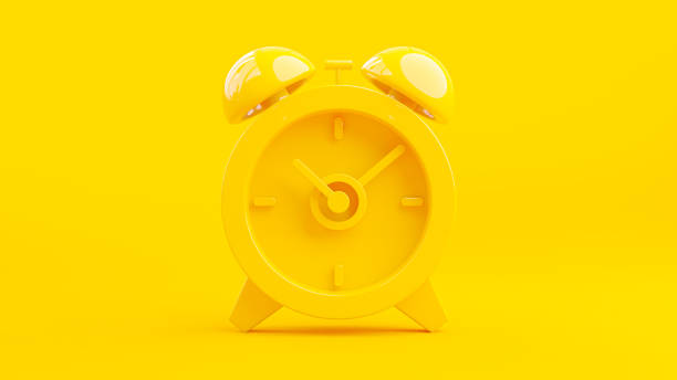 istock Yellow alarm clock on Yellow background. 1432373029