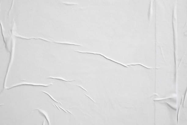 istock white crumpled and creased paper poster texture background 1432377832