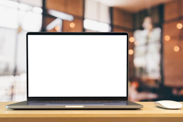 istock Laptop with blank screen on wood table with cafe coffee shop blur background 1432377857