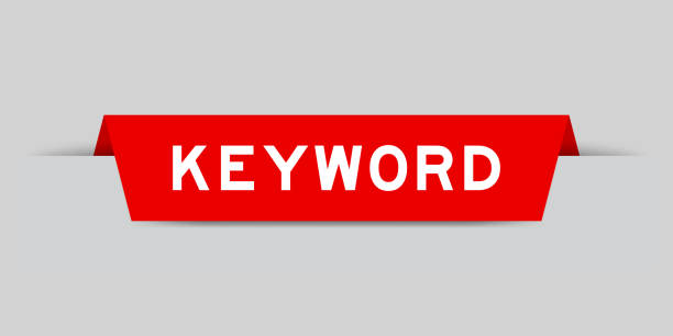 красная вставленная метка с ключевым словом word на сером фоне - keywords metadata single word optimization stock illustrations