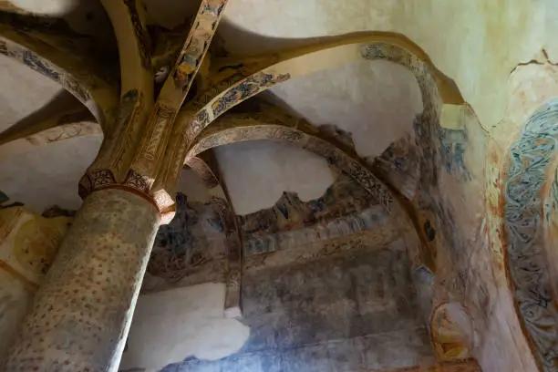 Interior of Hermitage of San Baudelio de Berlanga at Caltojar with remains of antique frescoes on walls and columns, Spain