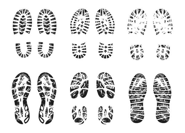 Grunge silhouette of footprint vector illustrations set Grunge silhouette of footprint vector illustrations set. Imprint of boots and sneakers, shoe stamps, human trace outline, tread of footsteps isolated on white background. Footwear, texture concept graphic print stock illustrations